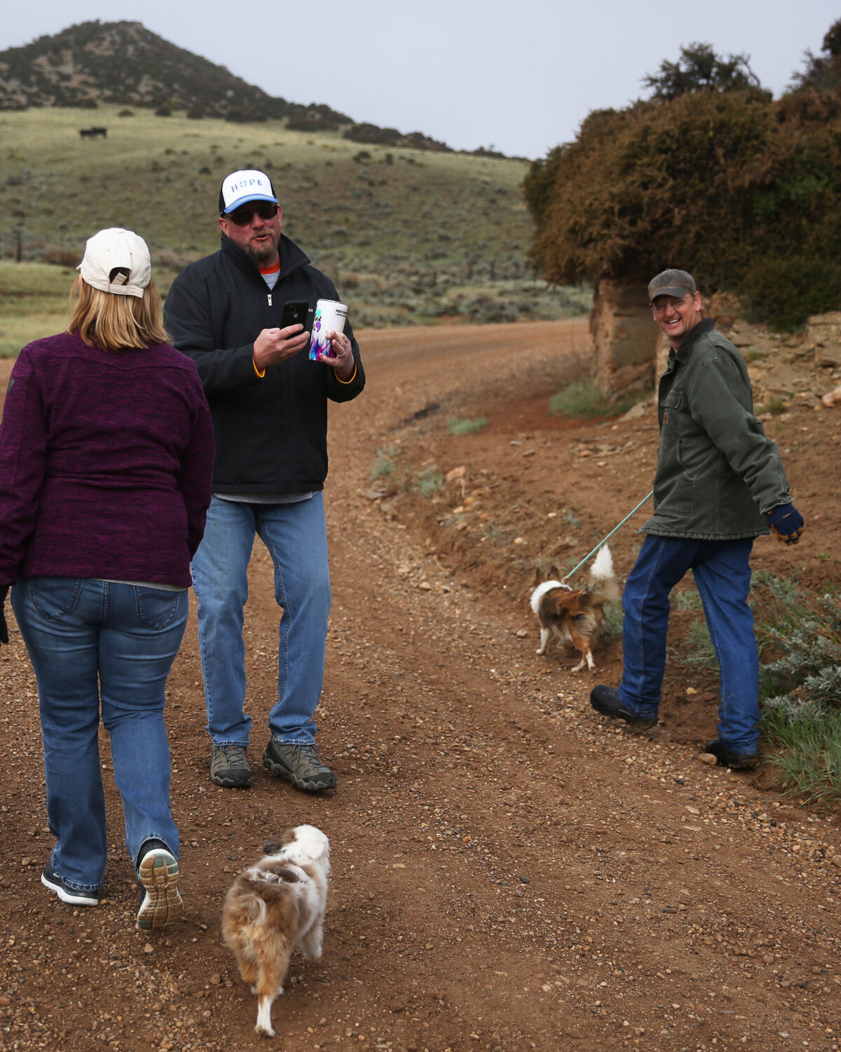 Bill Hawley walks backward to take photos